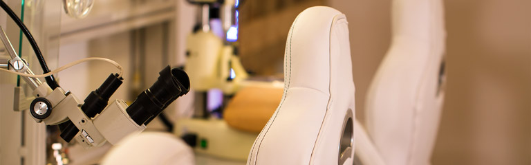 Close up photograph of a dental technician's chair.