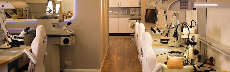 Dental technician work stations at Analog Implant Laboratory.